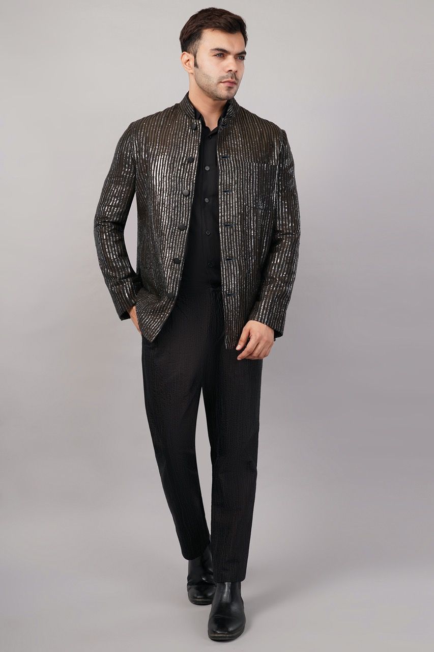 Abraham & Thakore-2 Large.jpeg