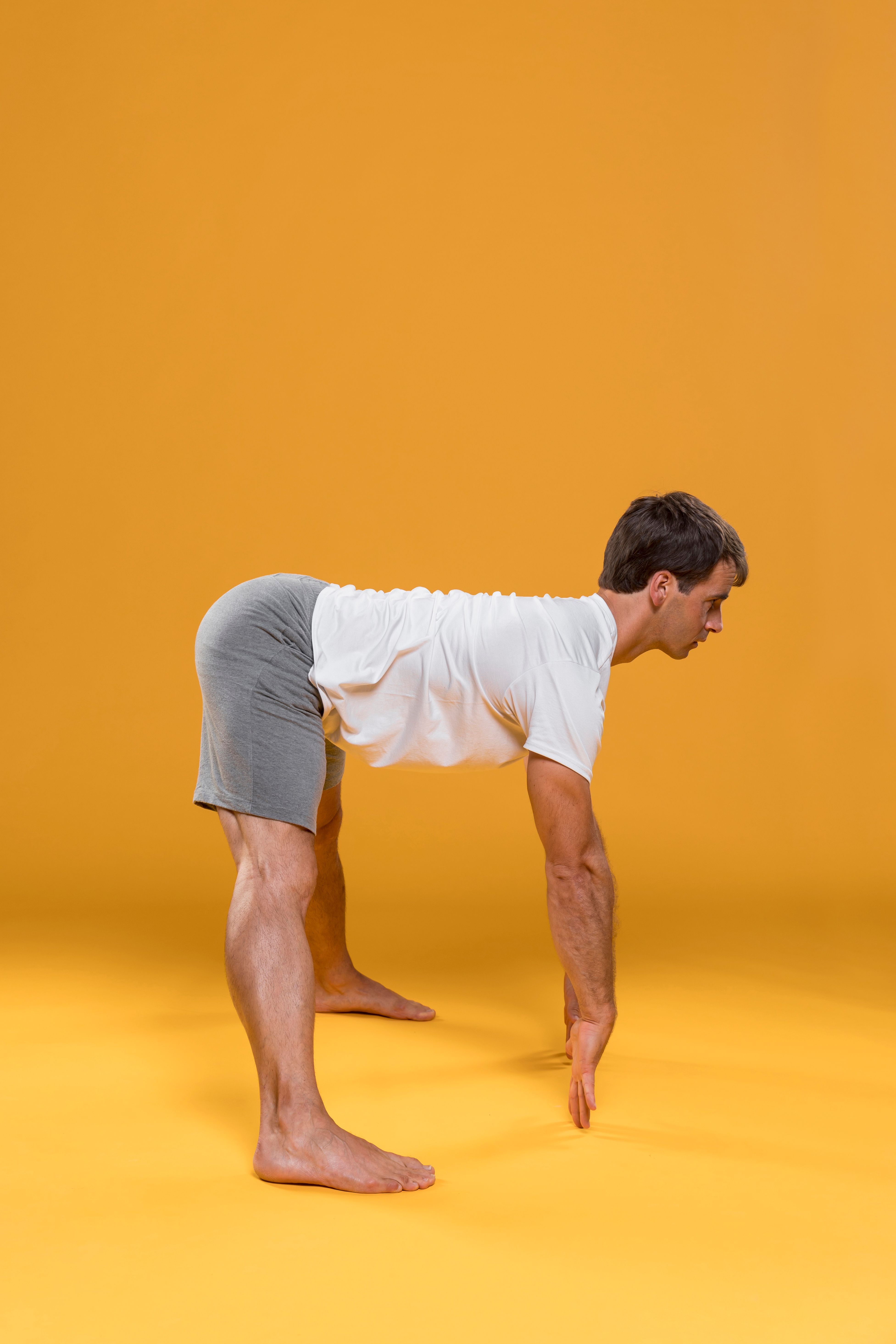 young-man-practicing-yoga-exercise.jpg